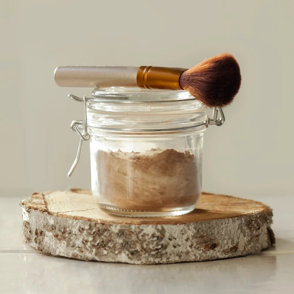 A jar of organic nontoxic chemicals free dry shampoo