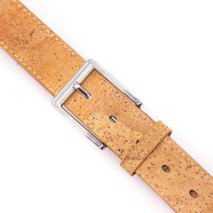 Close up of men's natural cork belt with silver buckle and belt holes
