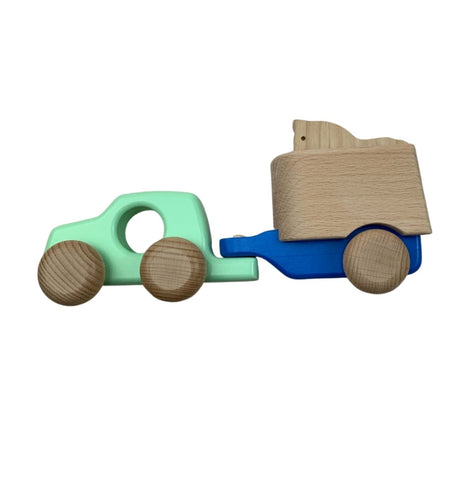 mint and blue car with horse trailer