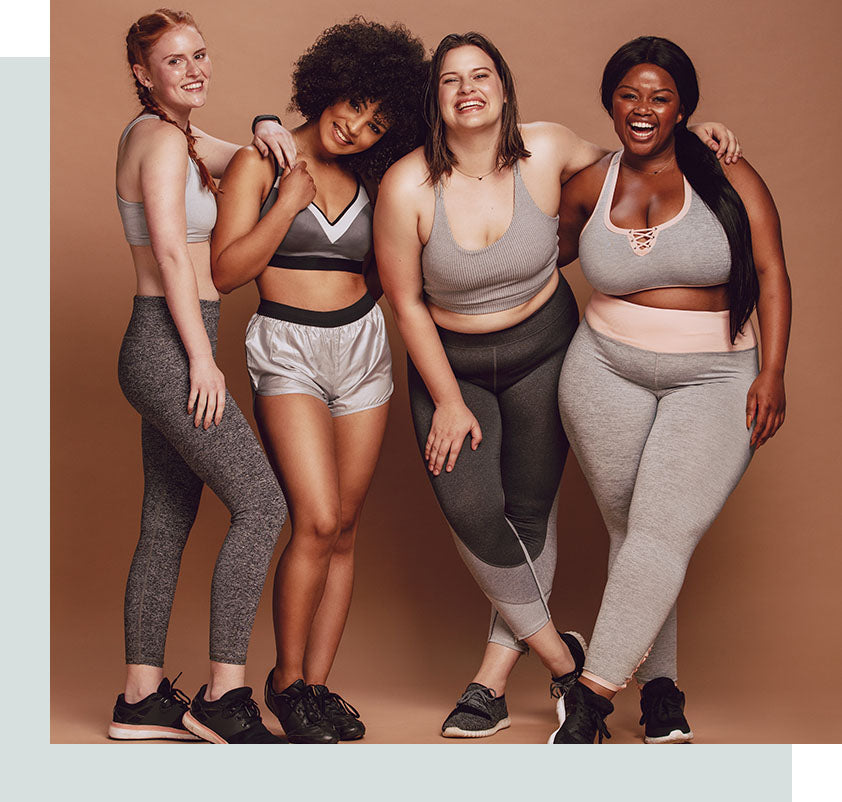 Young women of various body types and ethnicities smiling in activewear