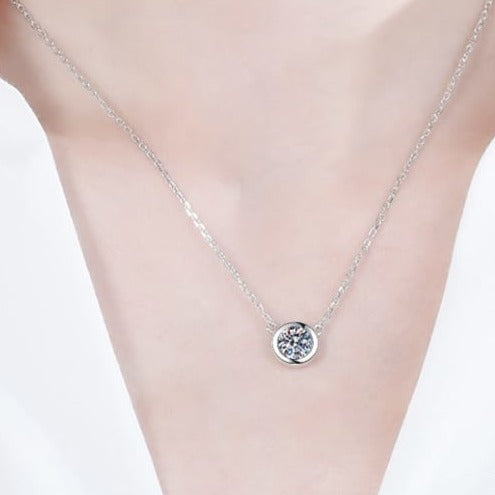 Bezel set round moissanite pendant necklace set in sterling silver