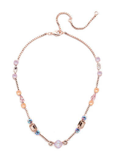 Poppy Tennis Necklace - NEN18RGLVP - The Poppy Tennis Necklace is anything but ordinary. Wear it all when you combine classic, baguette and navette sparklers. It's structured and sophisticated. From Sorrelli's Lavender Peach collection in our Rose Gold-tone finish.