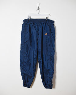 nike shell tracksuit bottoms