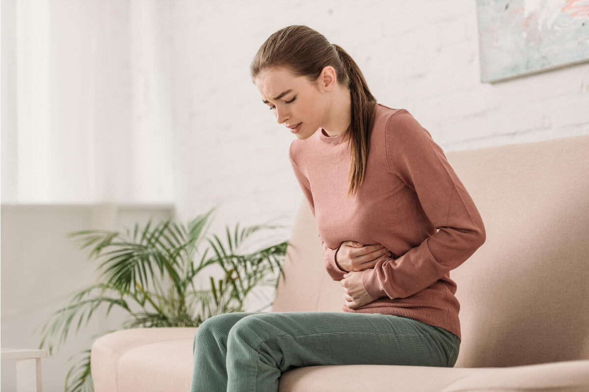 Woman Enduring Stomach Pain