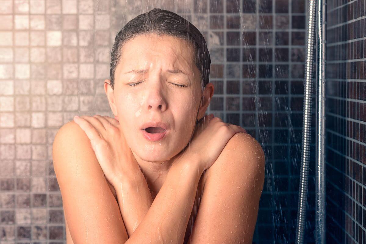 Woman Having a Cold Shower
