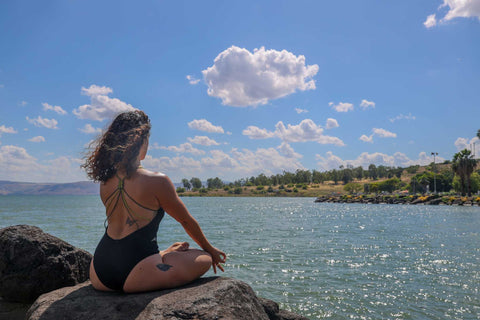 sitting in upright posture on coast