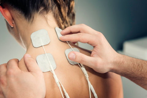 tens therapy on upper back