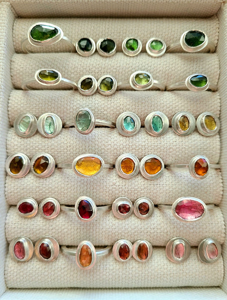 Colorful tourmaline stud earrings and rings set in sterling silver