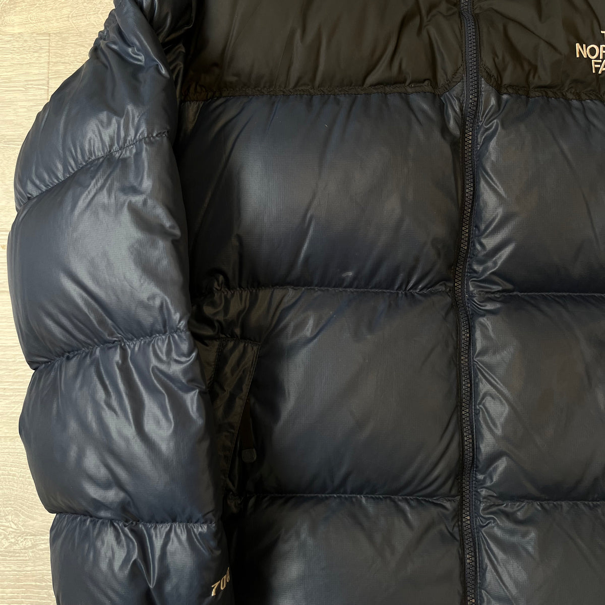 The North Face Navy Blue Puffer Jacket WITH SMALL STAIN | We Vintage