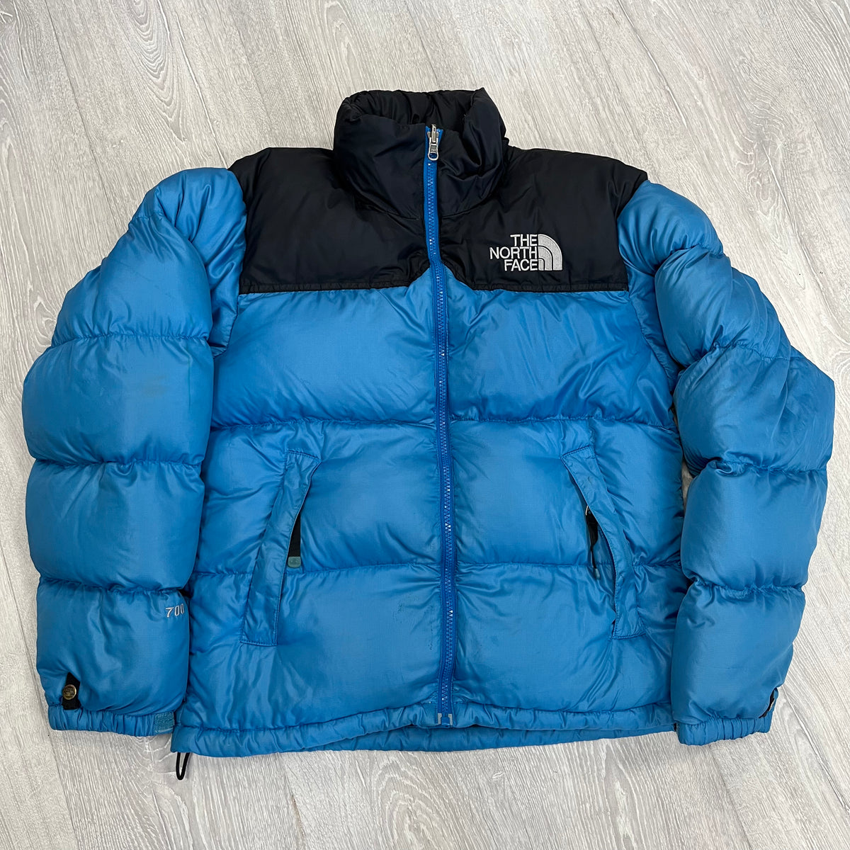 The North Face Baby Blue Puffer Jacket WITH STAIN | We Vintage