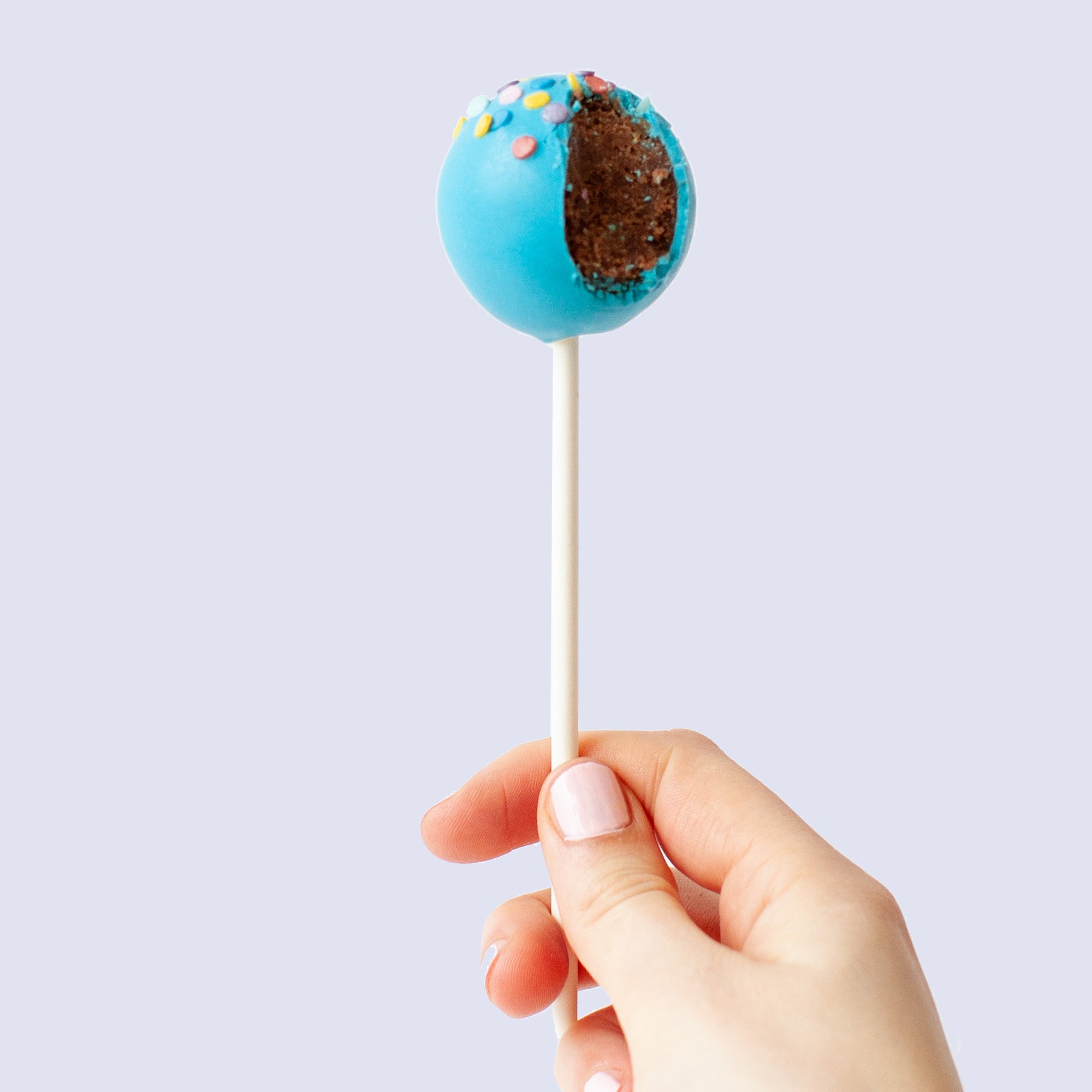 Pop Bakery cake pop with a bite taken out