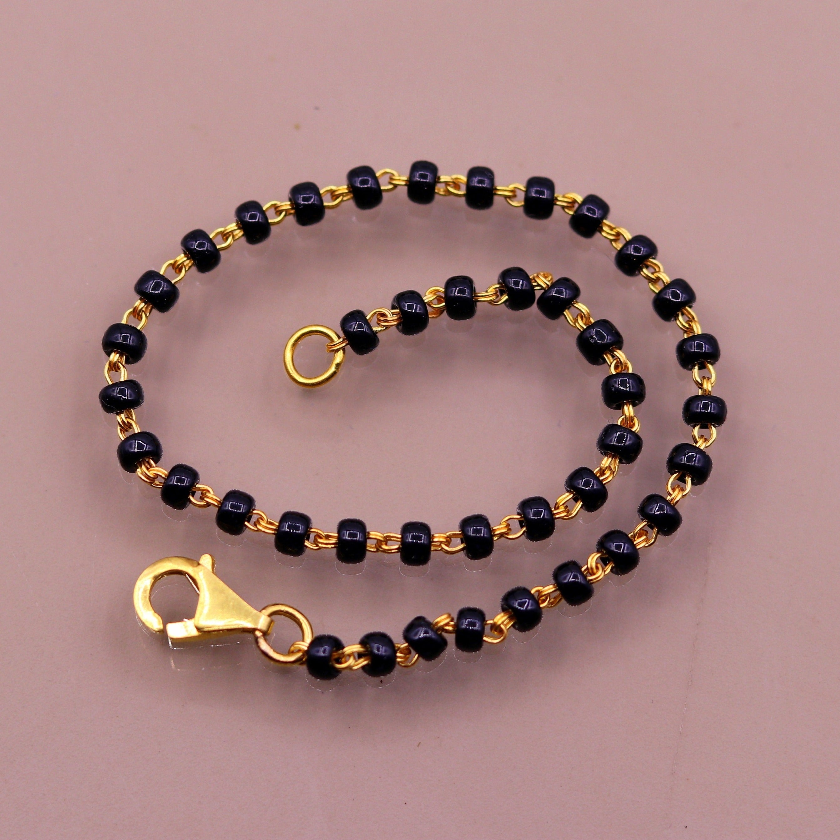22K Black Beads Gold Bracelet - BrLa18102 - 22k gold fancy bracelet  designed with black beads and gold balls teemed together with hanging gold b