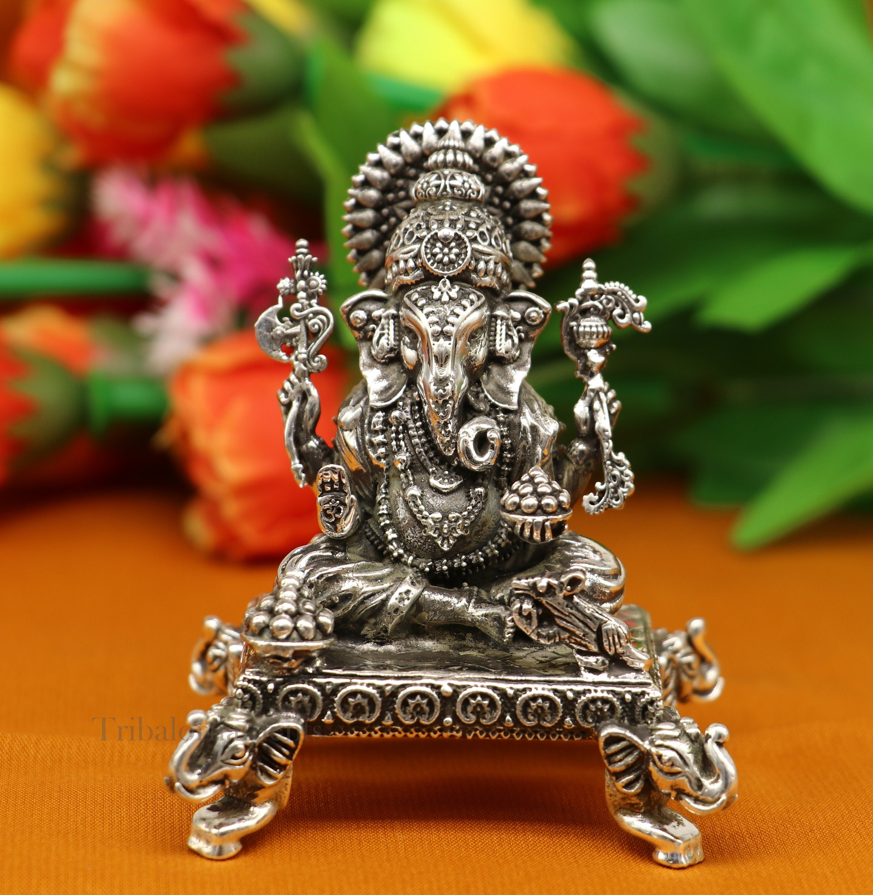 Silver ganesh laxmi sales murti price tanishq