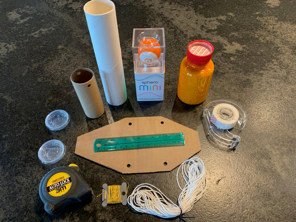 Materials for a Sphero lab kit including the Sphero Mini.