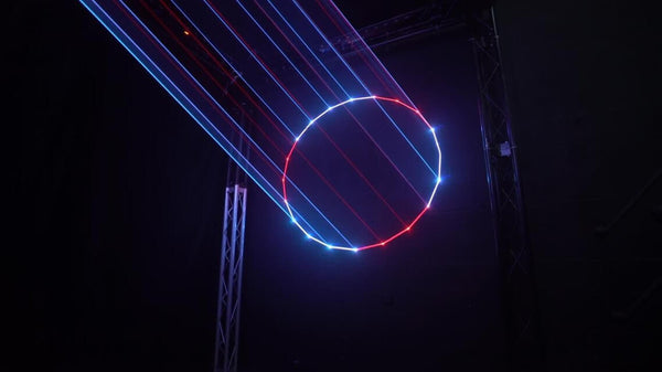 Laser Circle in Red and White with solid hot beams in Kvant Laser UK Demo Studio