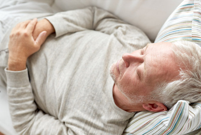 Older person asleep in a chair