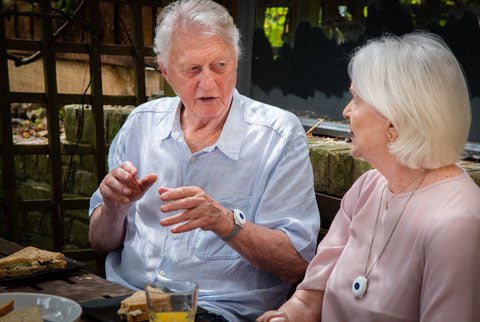 Elderly couple talking