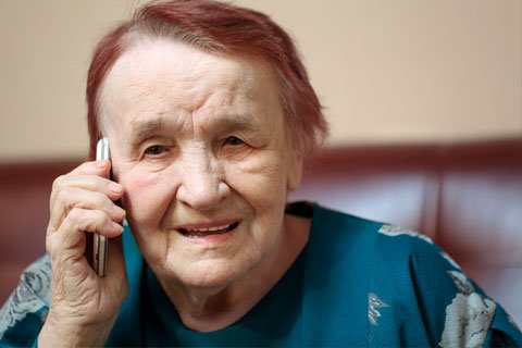 Elderly person on telephone