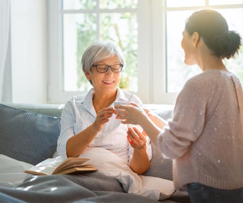 Elderly lady talking to daughter