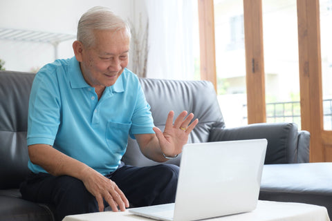 elderly man talking through video call