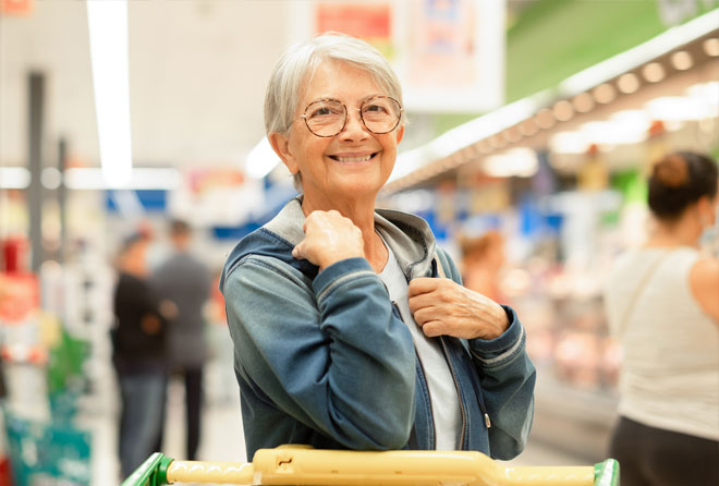 Elderly lady in shop