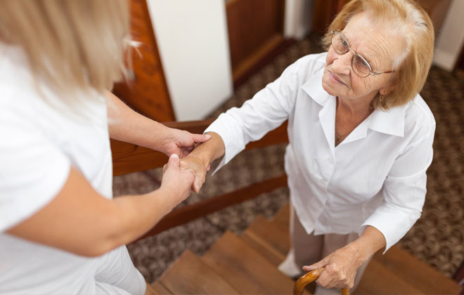 Elderly lady on stairs