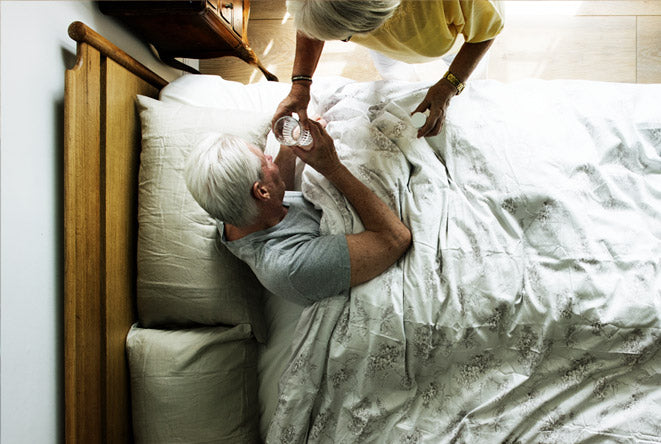 Elderly man struggling to sleep