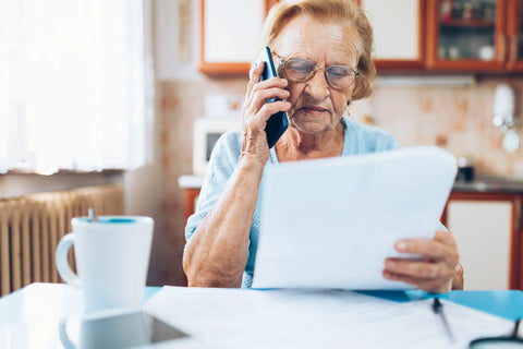 Elderly woman trying to sort her finances