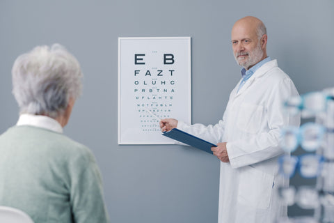 Elderly woman getting free eye test