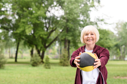 Elderly woman engaging in physical activity