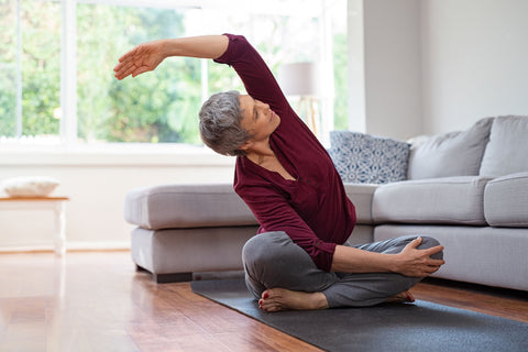 Elderly woman doing Yoga