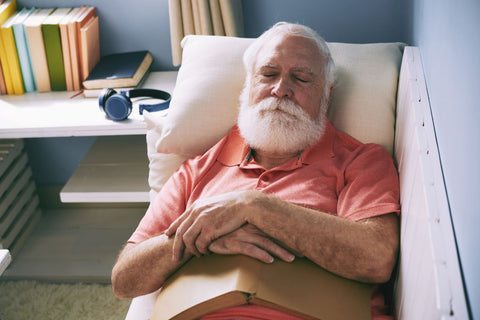 Elderly man napping in the day