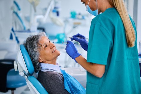 Elderly lady at dentist