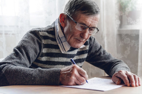 Elderly solving sudoku and crossword puzzles alone