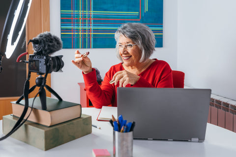 Senior woman recording her video for YouTube