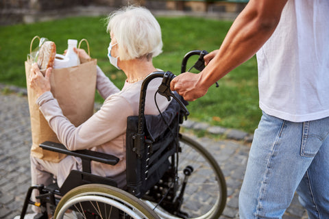 Helping elderly run errands during Christmas