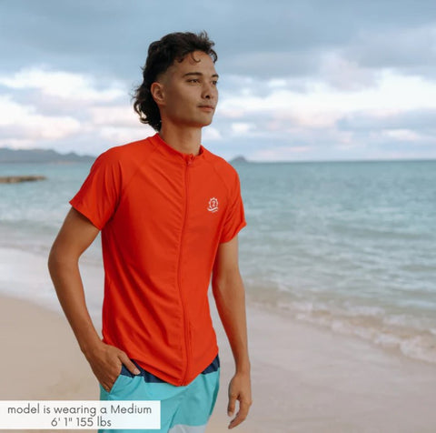 Young man wearing short sleeve rash guard