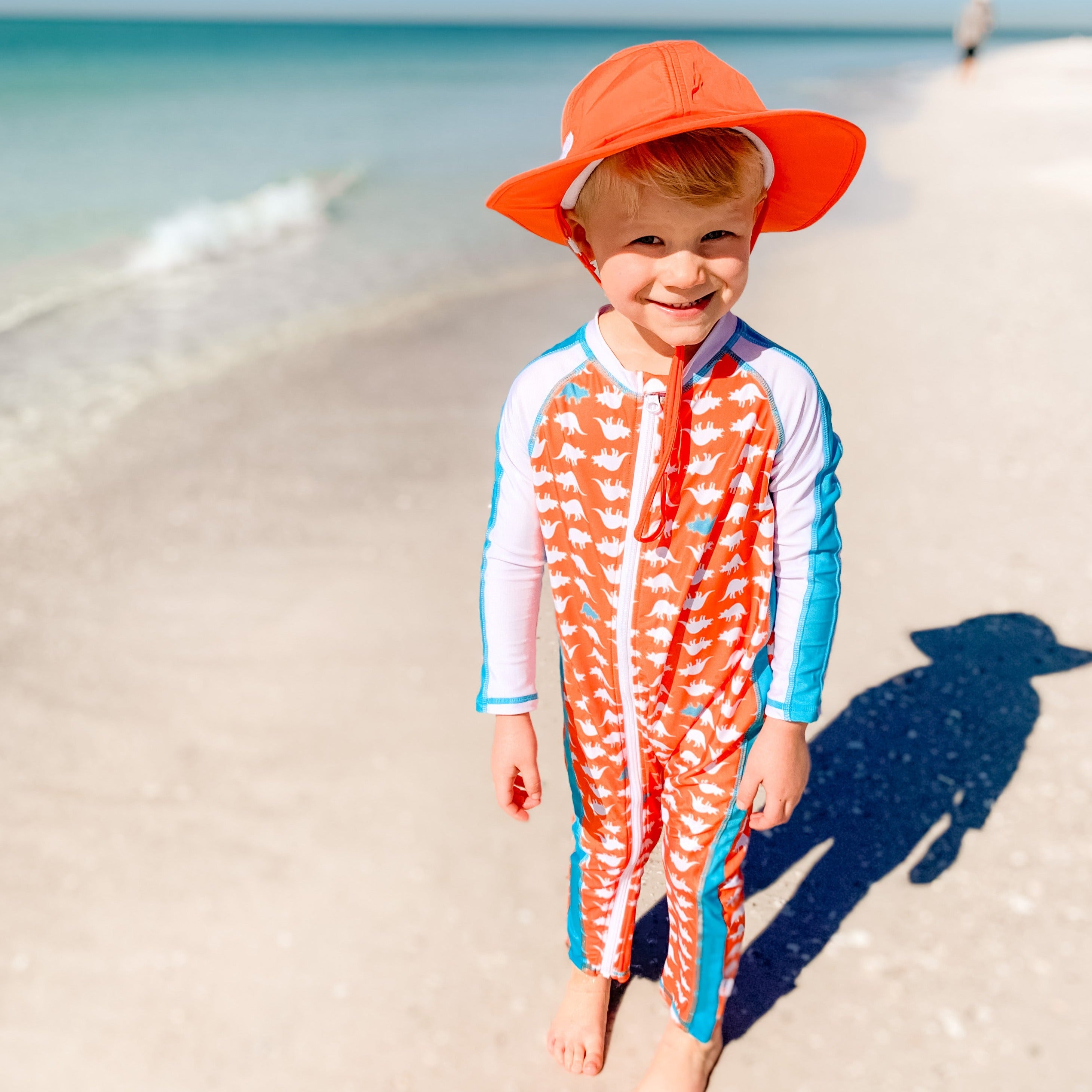 Little Girl In Swimming Hat And Pink Rash Top Playing In Wet Sand At Beach  (selective Focus) Stock Photo, Picture and Royalty Free Image. Image  71866155.