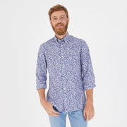 Blue shirt in cotton poplin with a floral pattern