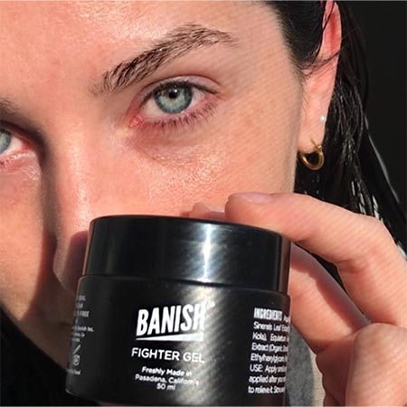 woman holding banish vitamin c creme