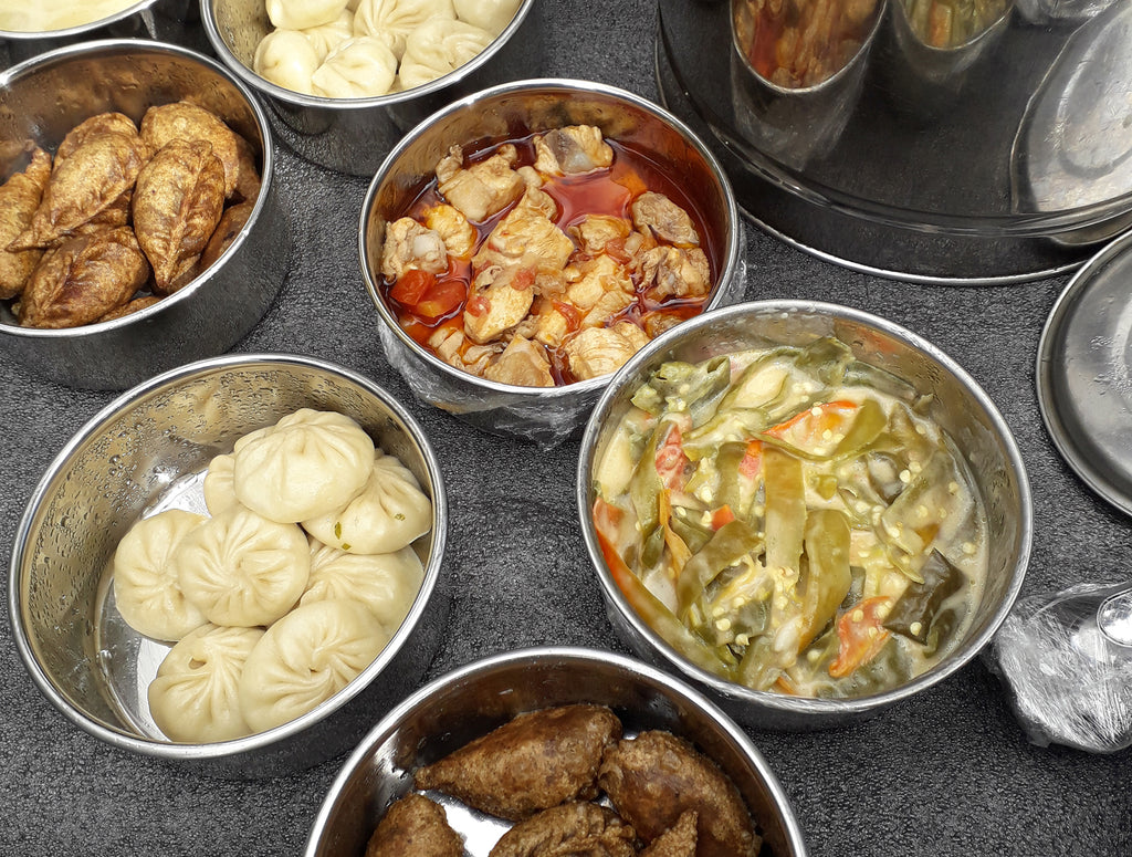 Bhutanese food specialities including chilli cheese and momos.