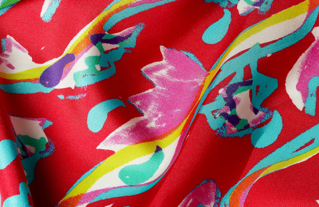 Colourful screen printed scarf detail by Crimson Rose O'Shea using red, oink, yellow, turquoise and purple.