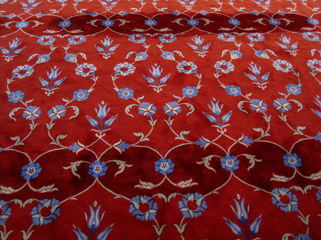 Photo of a red floral carpet in a mosque in Istanbul.