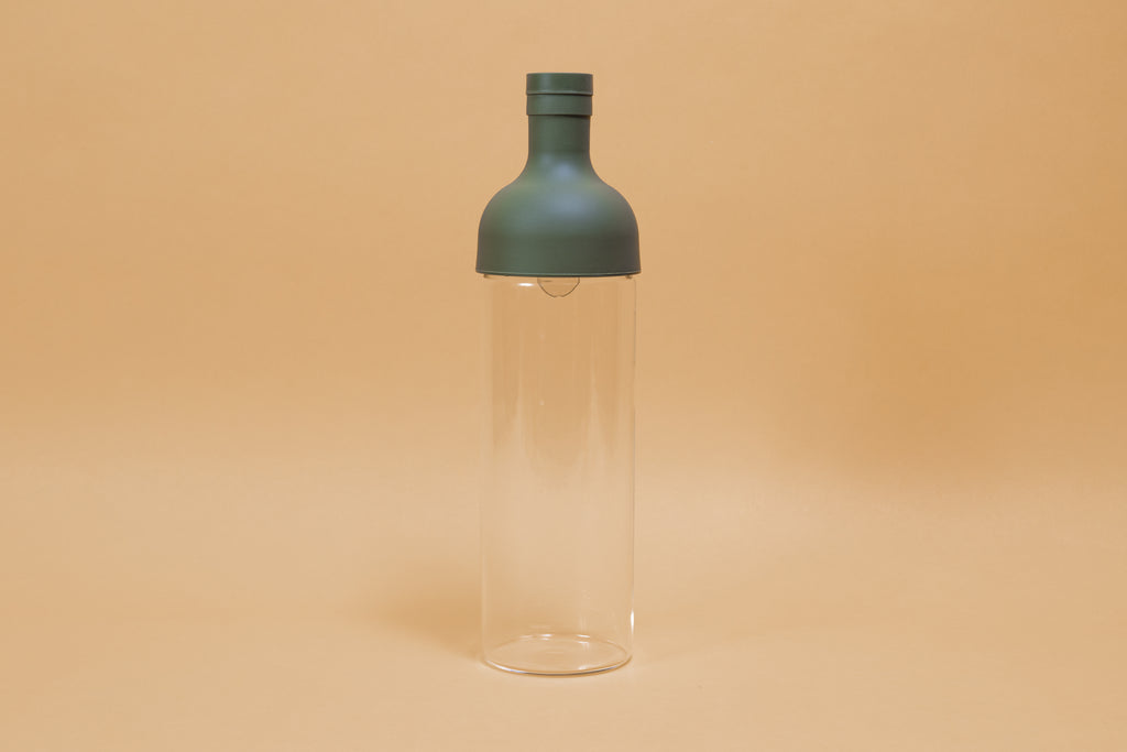 Glass bottle with rubber cap