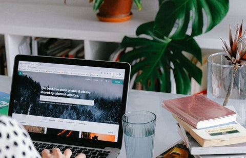 Person at laptop in home office