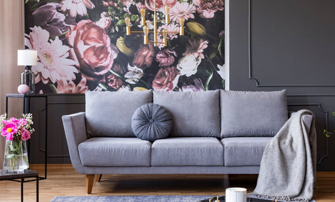 Grey sofa with floral decor