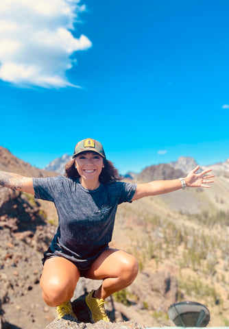 Wayward & Wild ambassador Shea wearing the Force To Be Reckoned With t-shirt while outdoors exploring