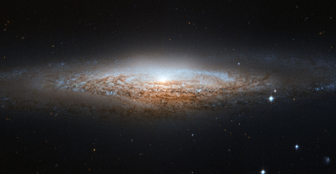 NGC 2683 is an unbarred spiral galaxy discovered by William Herschel on 5 February 1788.