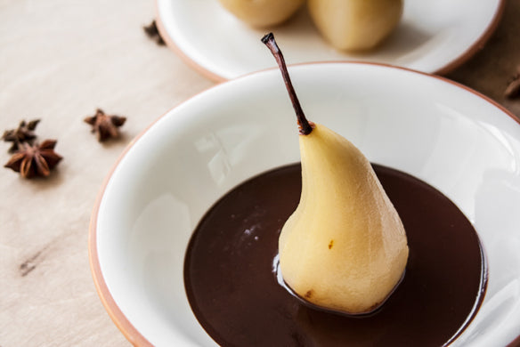 SPICED POACHED PEARS WITH WARM CHOCOLATE SAUCE by Ora Coren (Photo by Lee Coren)