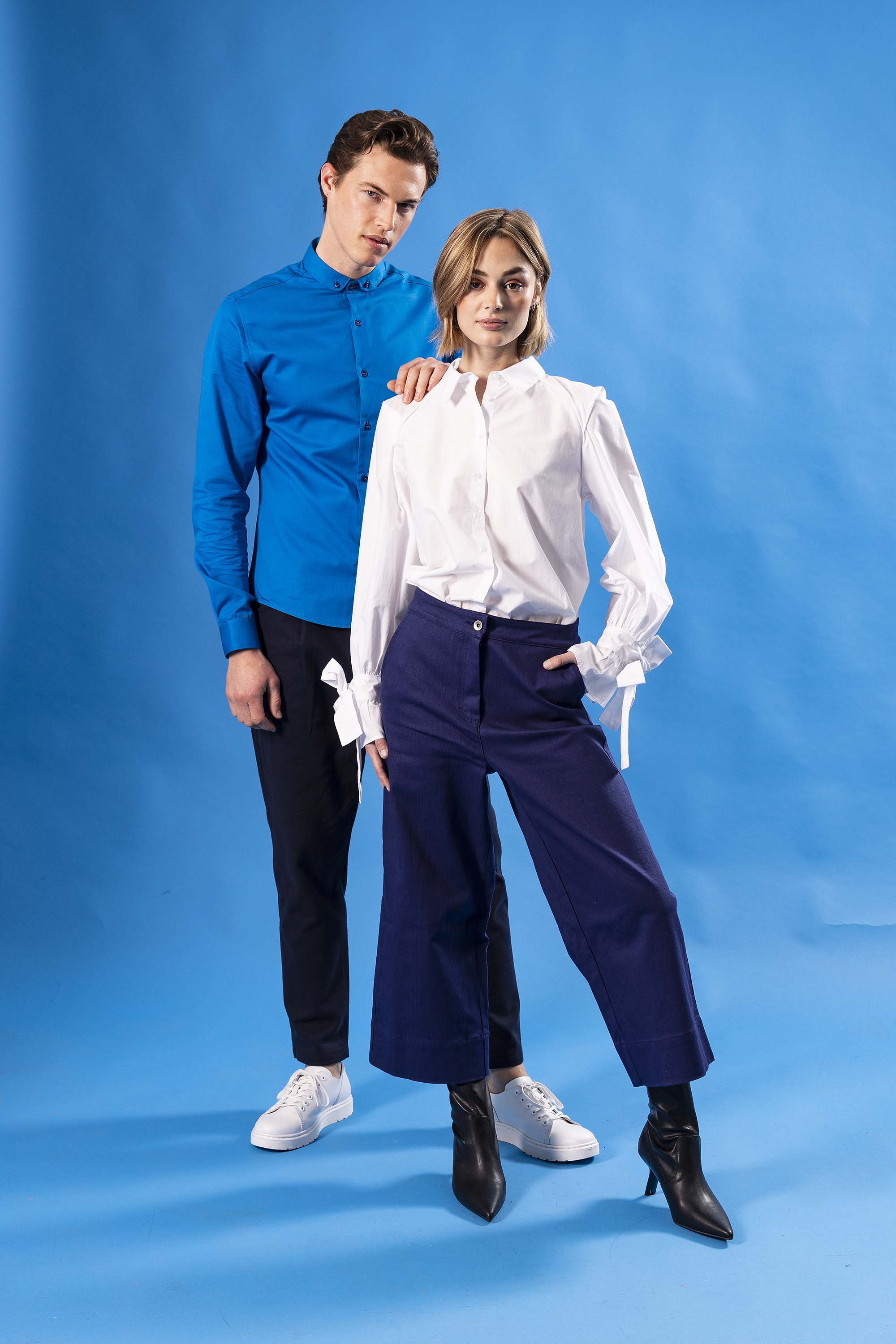 Women's indigo blue wide leg trousers and white raglan sleeve shirt